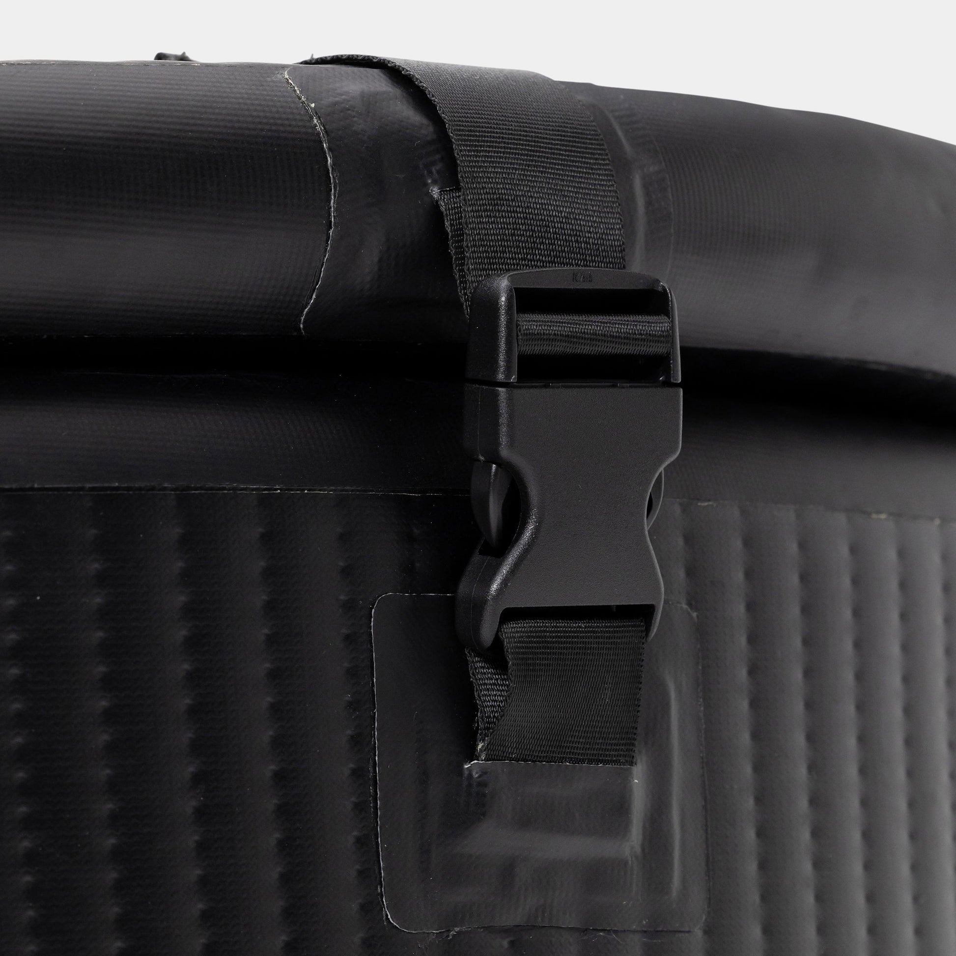 Close-up of reinforced strap on Vault Ice Bath for durability.